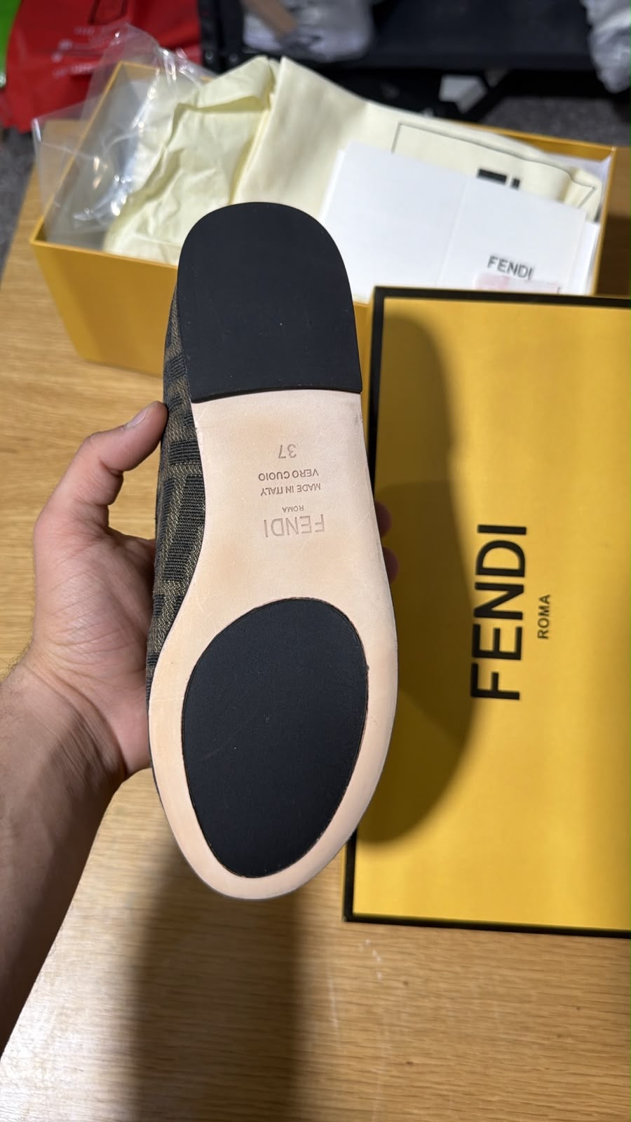 Fendi  Ballerinas in tobacco FF logo jacquard fabric with a small bow detail and elastic logo strap