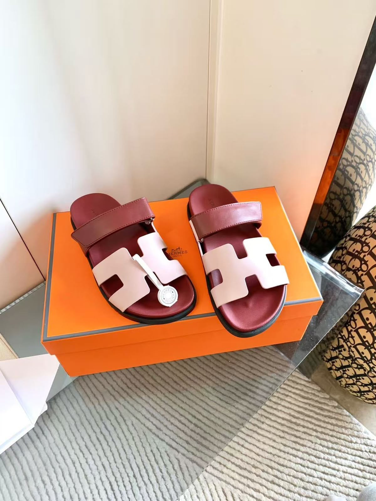 Hermès Chypre sandals featuring the iconic cutout "H" vamp and an adjustable upper strap