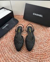 Channel woven slingback flats featuring an intricate braided design and a sleek pointed toe