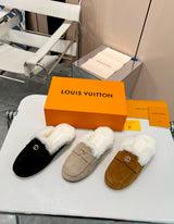 Louis Vuitton Soho Open Back Loafers crafted in soft suede calf leather with a plush shearling lining and a gold-toned LV Circle accessory