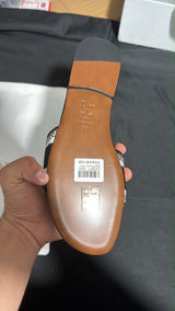 Dior Dway slides featuring the signature white "Christian Dior Paris" lettering across the upper strap