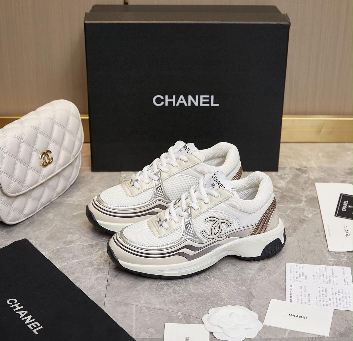 Chanel fabric and laminated calfskin stretch CC sneakers