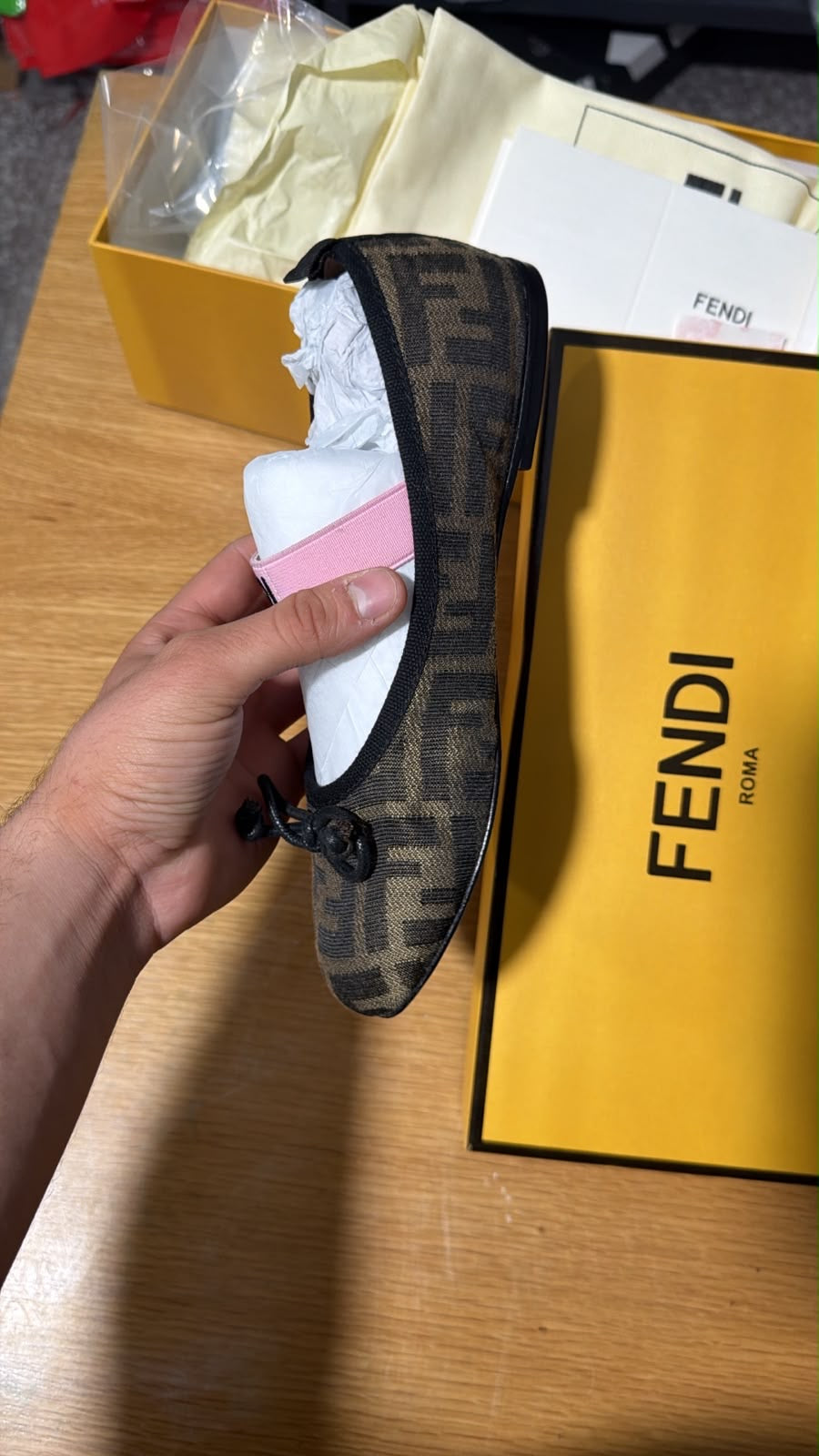Fendi  Ballerinas in tobacco FF logo jacquard fabric with a small bow detail and elastic logo strap