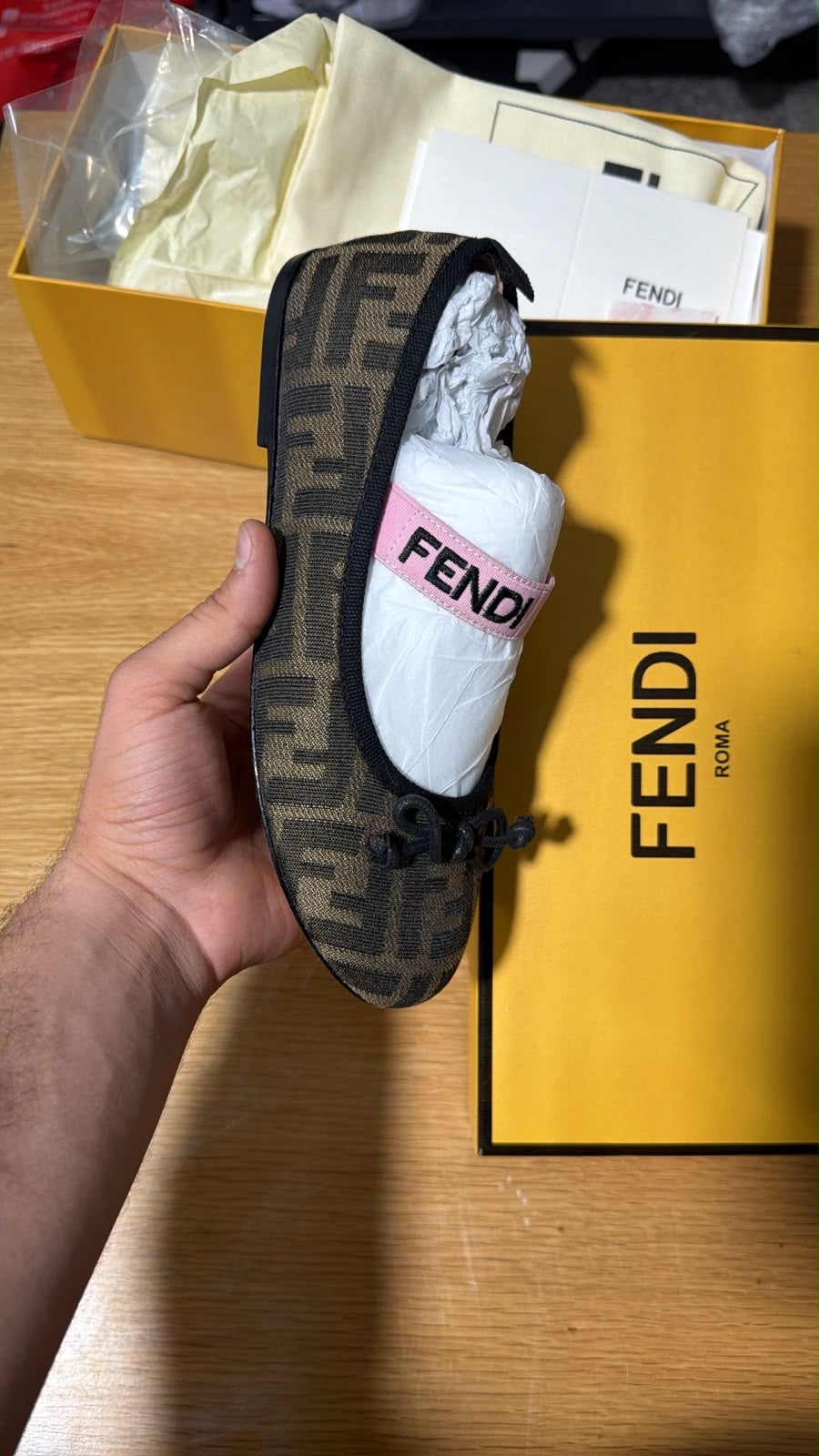 Fendi  Ballerinas in tobacco FF logo jacquard fabric with a small bow detail and elastic logo strap