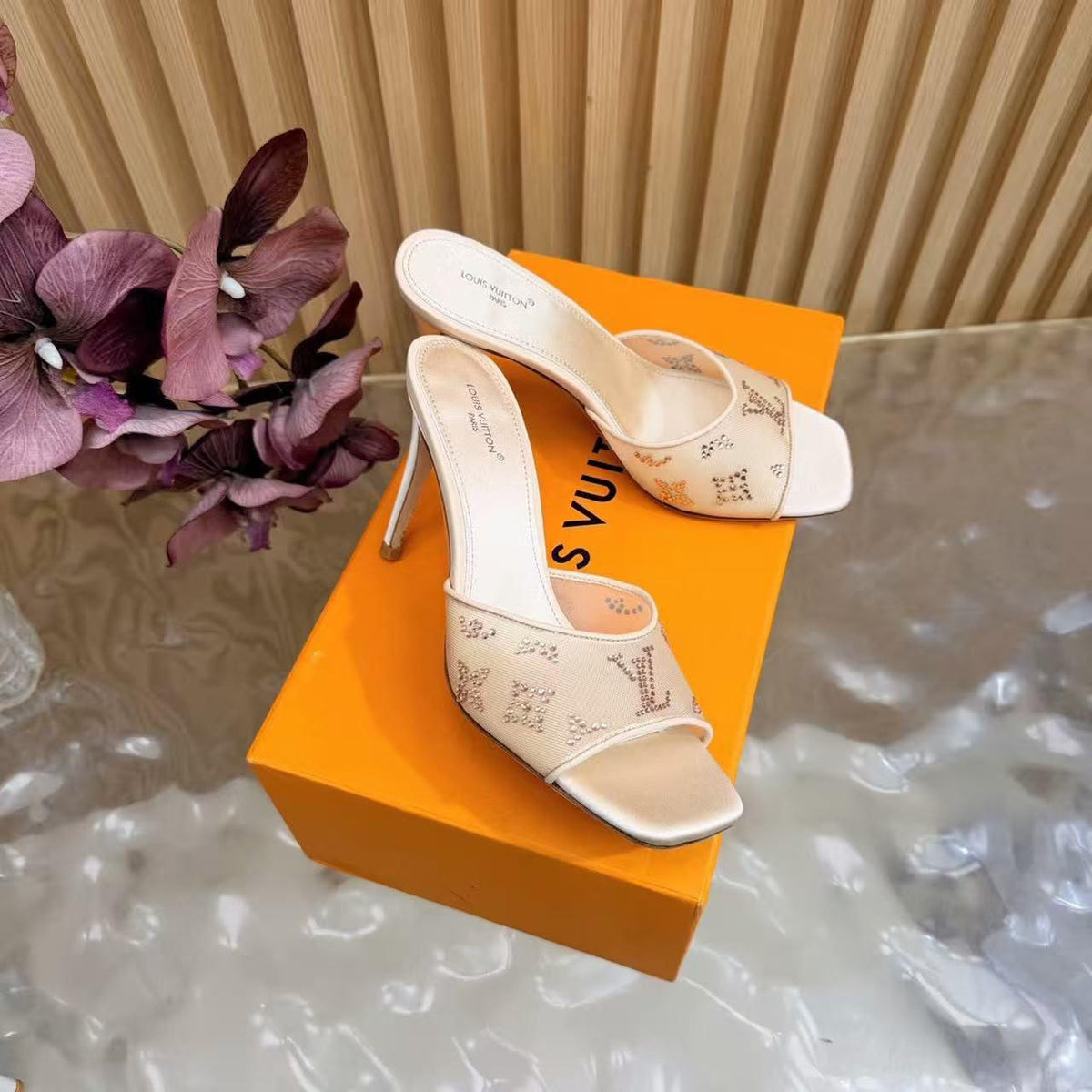 Louis Vuitton Gala Mules in nude beige mesh embellished with shimmering rhinestones forming the iconic Monogram pattern