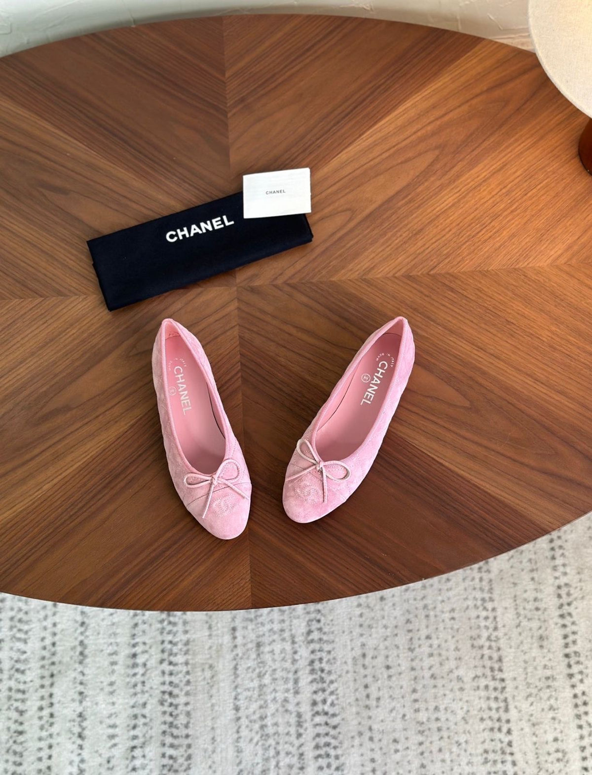 Ballerina flats, featuring a soft quilted texture and a delicate front bow with the signature CC logo