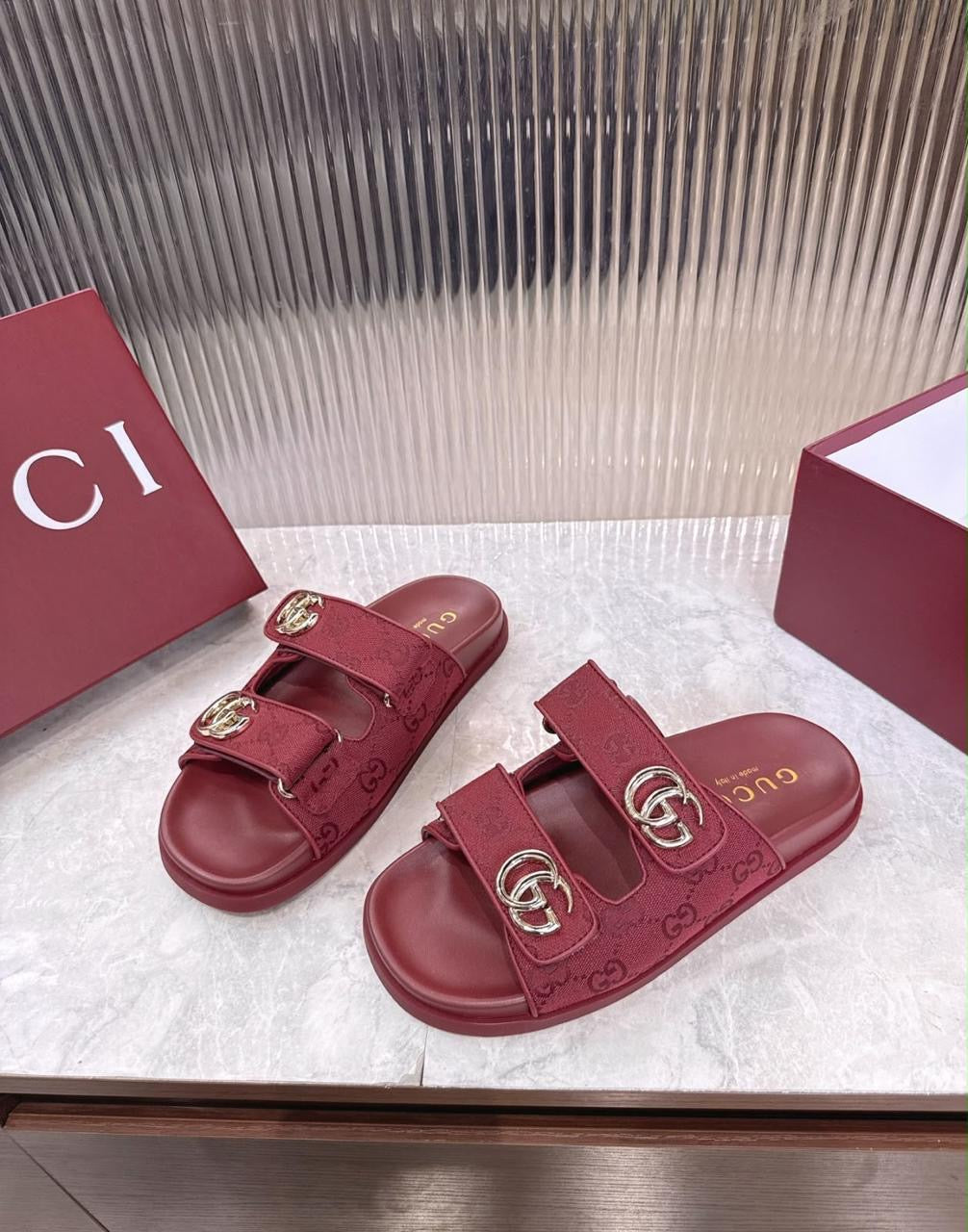 Gucci double-strap sandals with gleaming light gold-toned Double G hardware