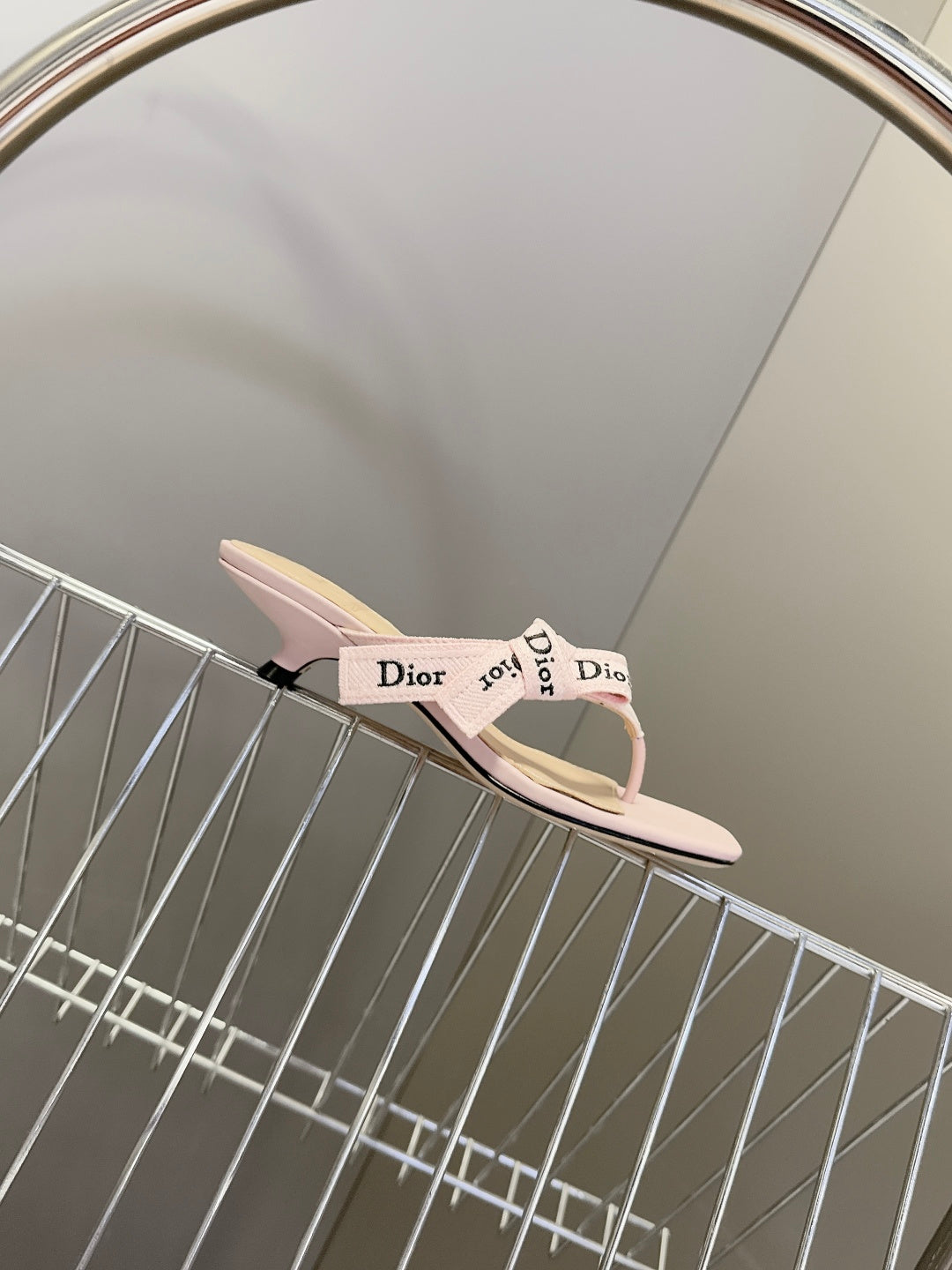 Dior's latest J'Adior flip-flops with kitten heels