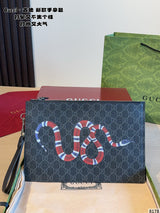 Gucci carrying a tiger head bag