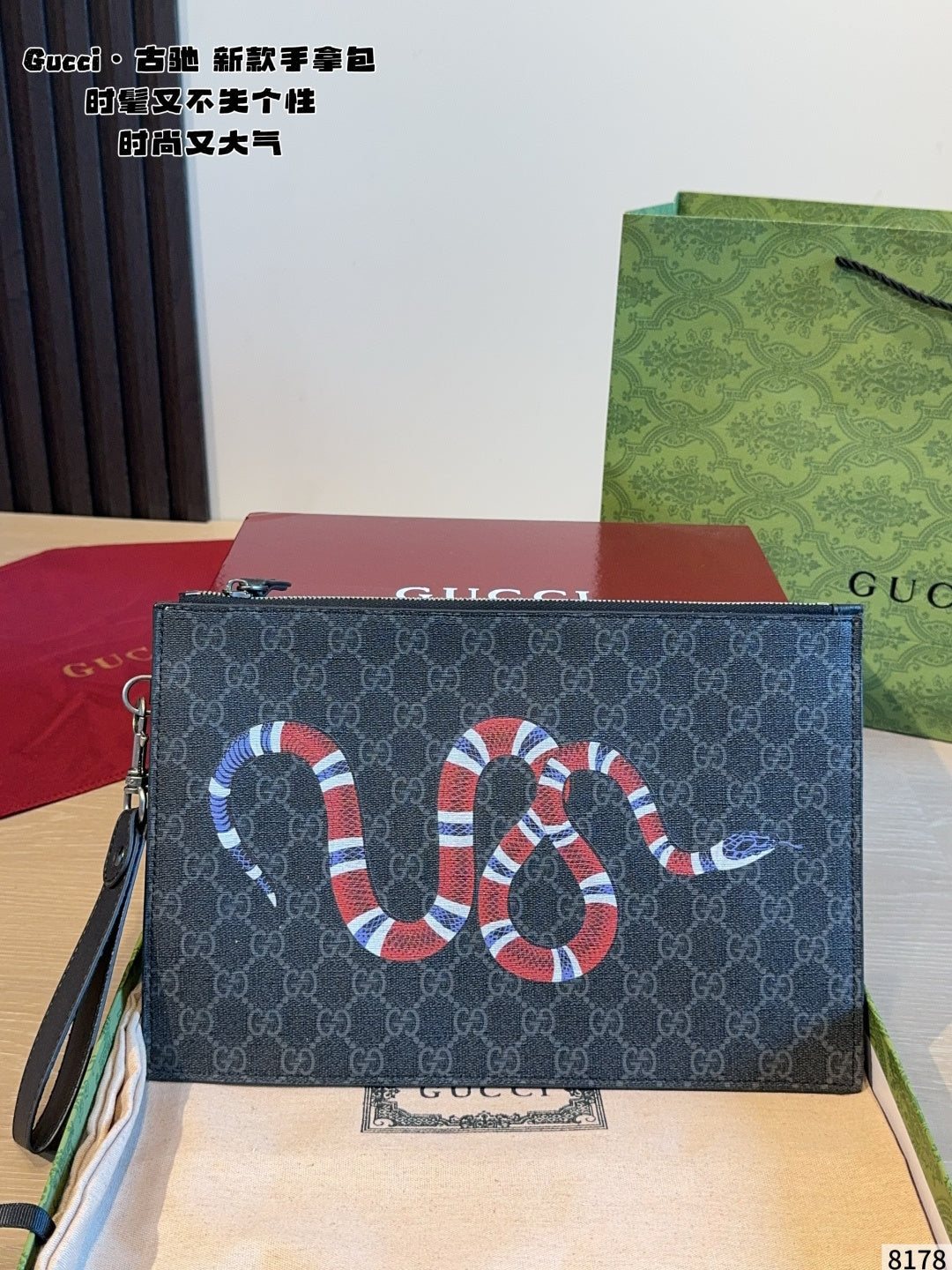 Gucci carrying a tiger head bag