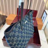 Comes with a box measuring 25*20 cm. This Gucci denim tote bag features GG Supreme monogram canvas with leather trim and handles, and a gold-tone metal logo plate. The bag has Gucci's classic structured tote silhouette, understated yet stylish, suitable for everyday wear without being too formal. (Ej)