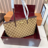 Comes with a box measuring 25*20 cm. This Gucci denim tote bag features GG Supreme monogram canvas with leather trim and handles, and a gold-tone metal logo plate. The bag has Gucci's classic structured tote silhouette, understated yet stylish, suitable for everyday wear without being too formal.