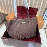Comes with a box measuring 25*20 cm. This Gucci denim tote bag features GG Supreme monogram canvas with leather trim and handles, and a gold-tone metal logo plate. The bag has Gucci's classic structured tote silhouette, understated yet stylish, suitable for everyday wear without being too formal.